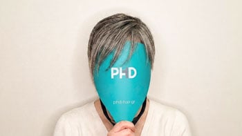 Μοντελα Συστηματων Μαλλιων 74 A Man With A Black Mask Over His Face Wearing Hair System